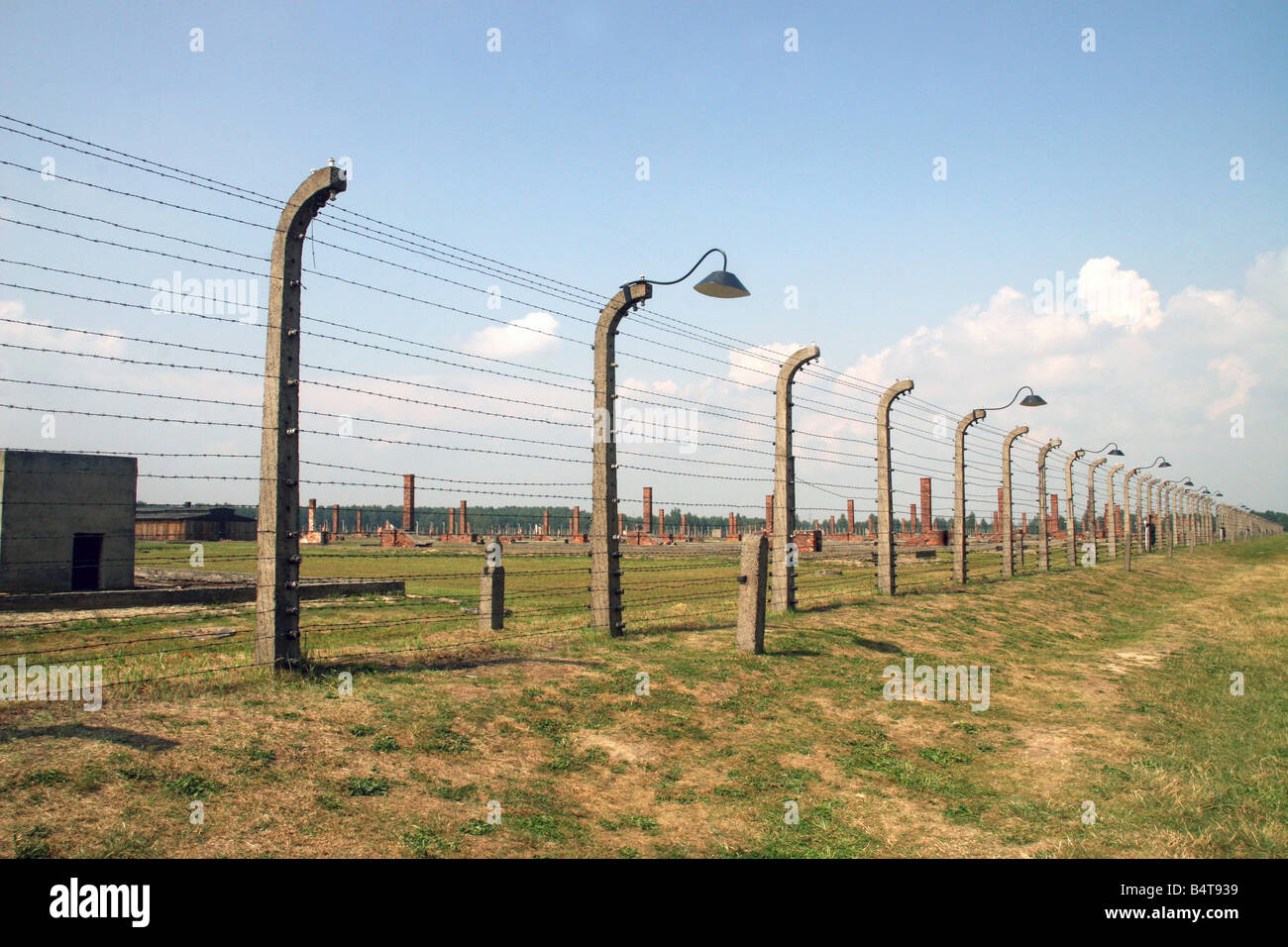 Barbed wire fence in Auschwitz Stock Photo