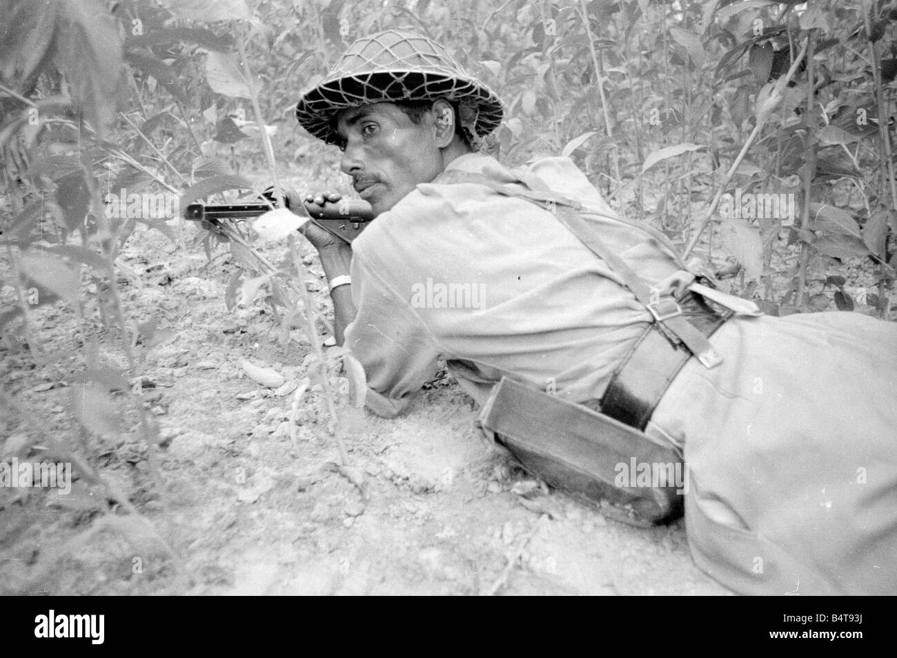 Pakistan - Bangladesh Civil War 15th June 1971;A large area of East Pakistan territory is under the control of the Bangladesh Freedom Fighters. These pictures were taken on patrol with an operational unit whose camp is in the Jungle just inside the Indian border.;Our Picture Shows: Troops on patrol in East Pakistan Stock Photo