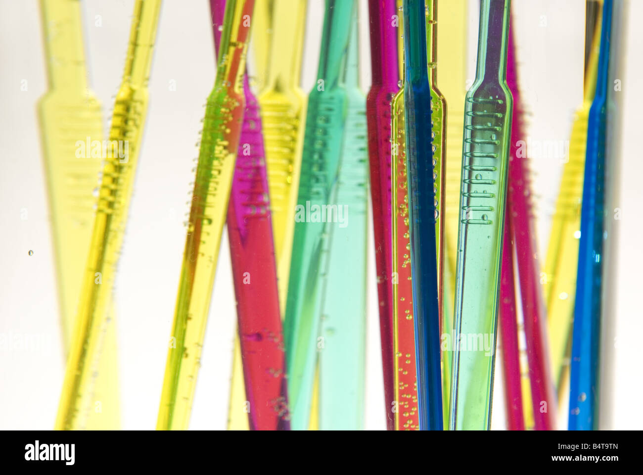 detail of submerged and floating brightly coloured toothbrushes Stock ...