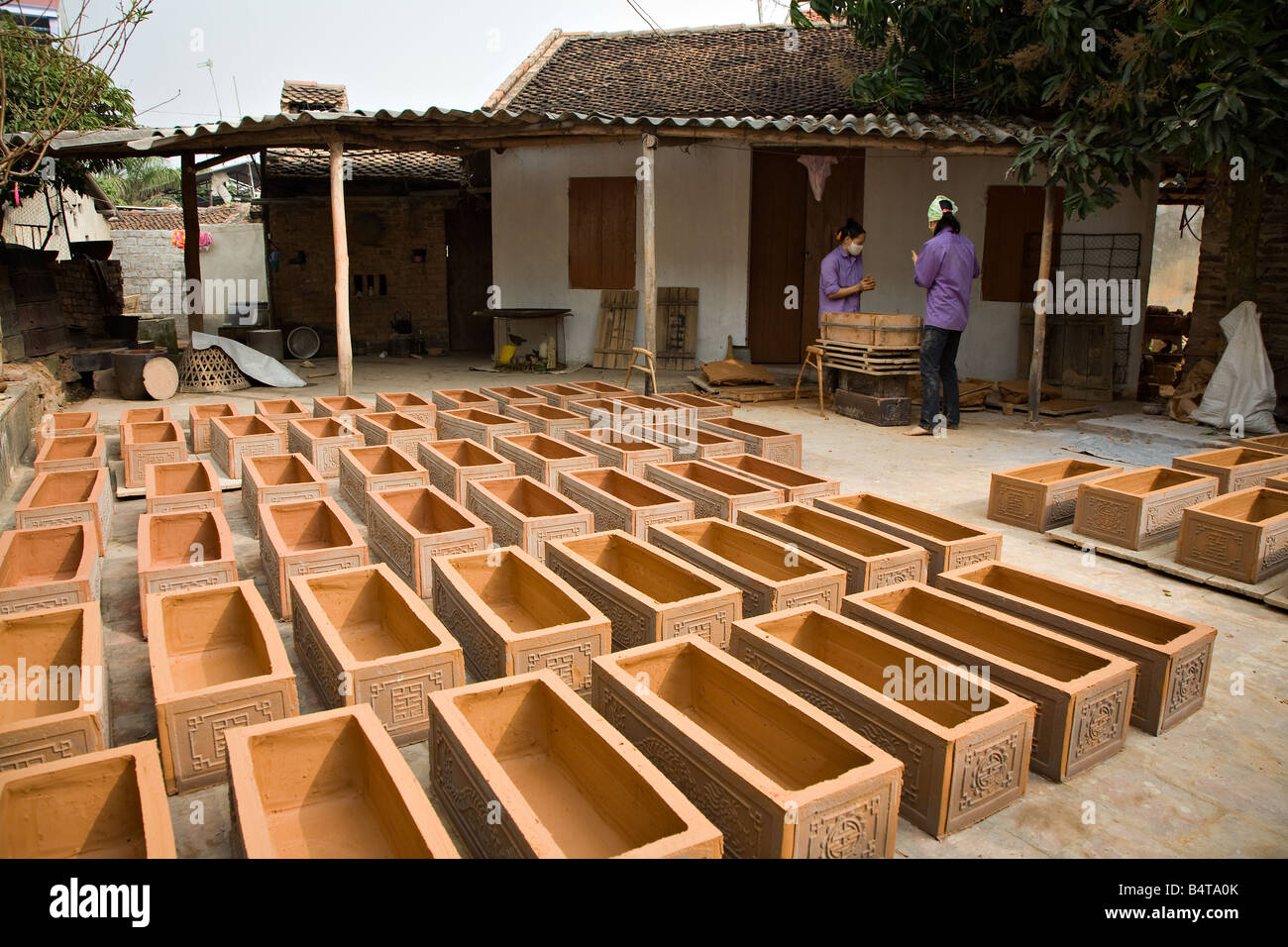 Pottery worker at ceramic factory Stock Photo Alamy