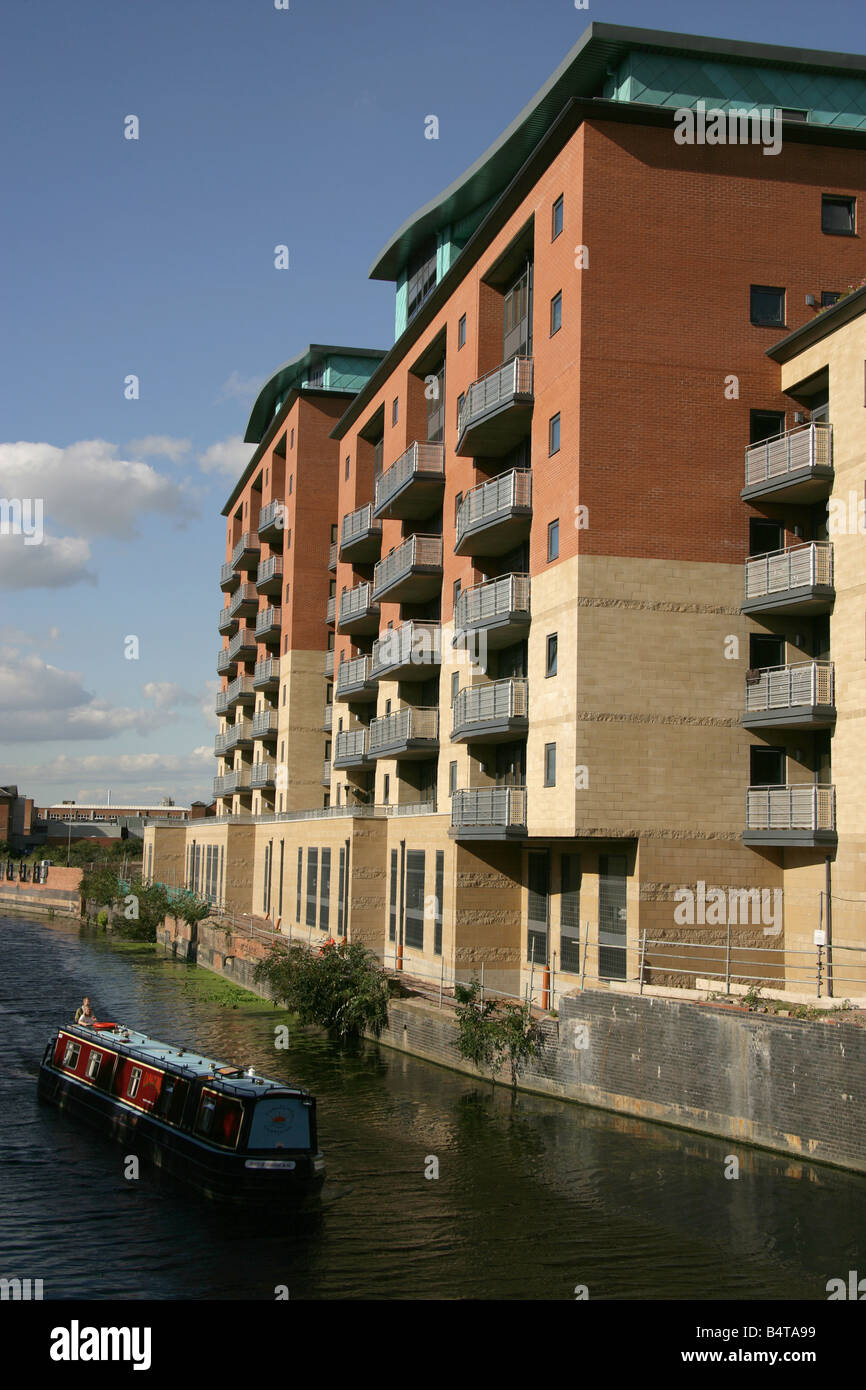 City of Leicester, England. Canal boat on the River Soar with modern