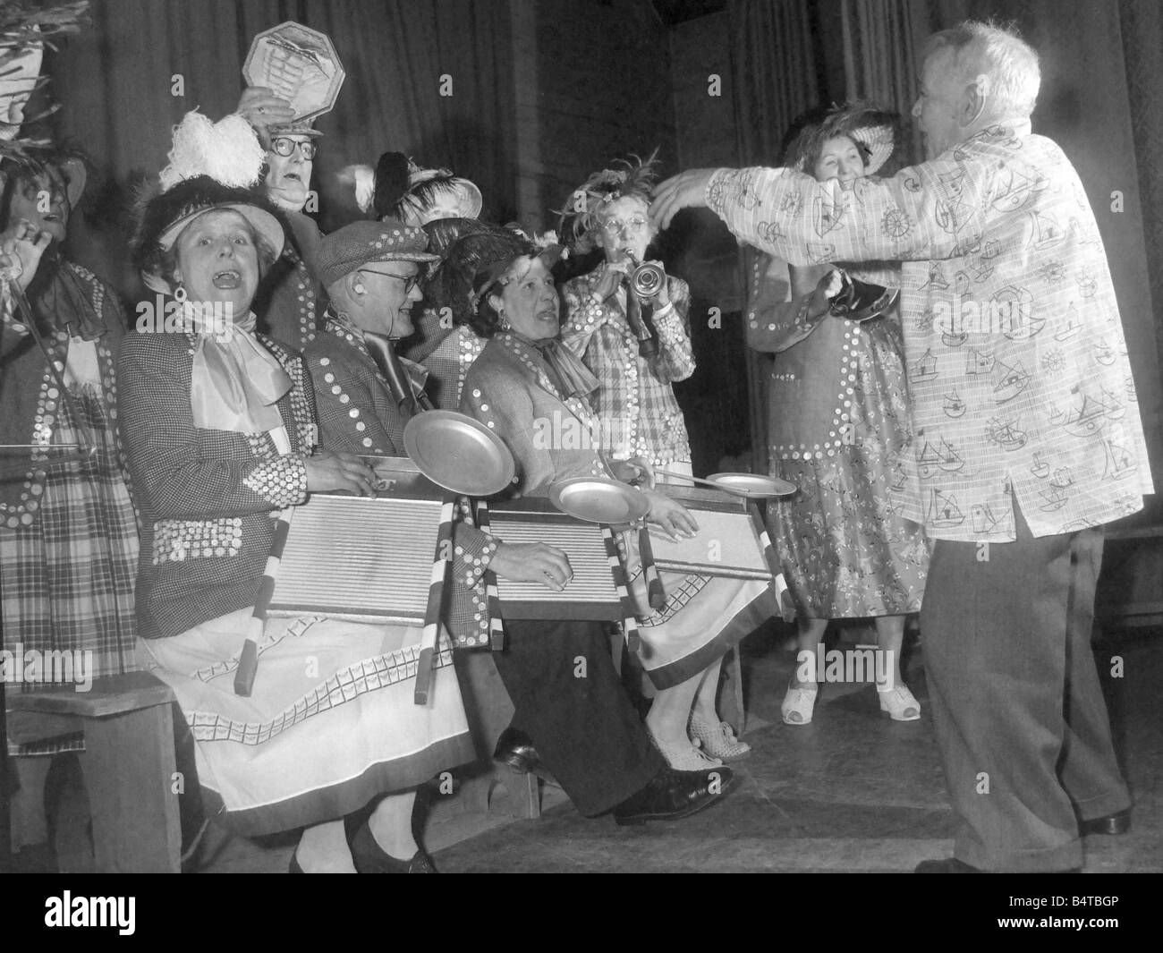 Pearly kings and queens play the washboard and other musical