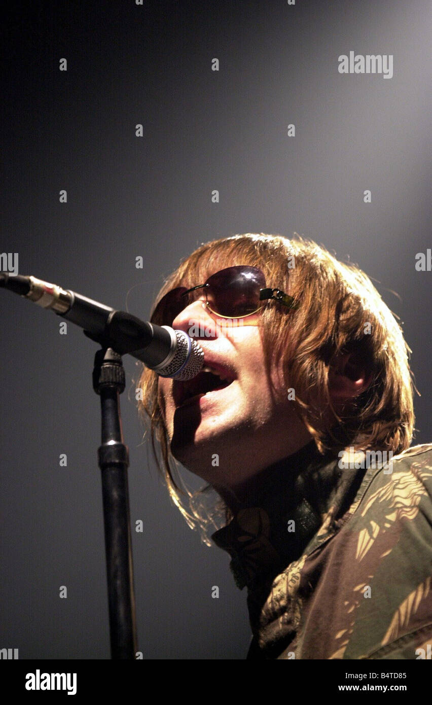 Oasis singer Liam Gallagher pictured on the first night of their UK tour at  Cardiff International Arena 8th Dec 2002 Stock Photo - Alamy