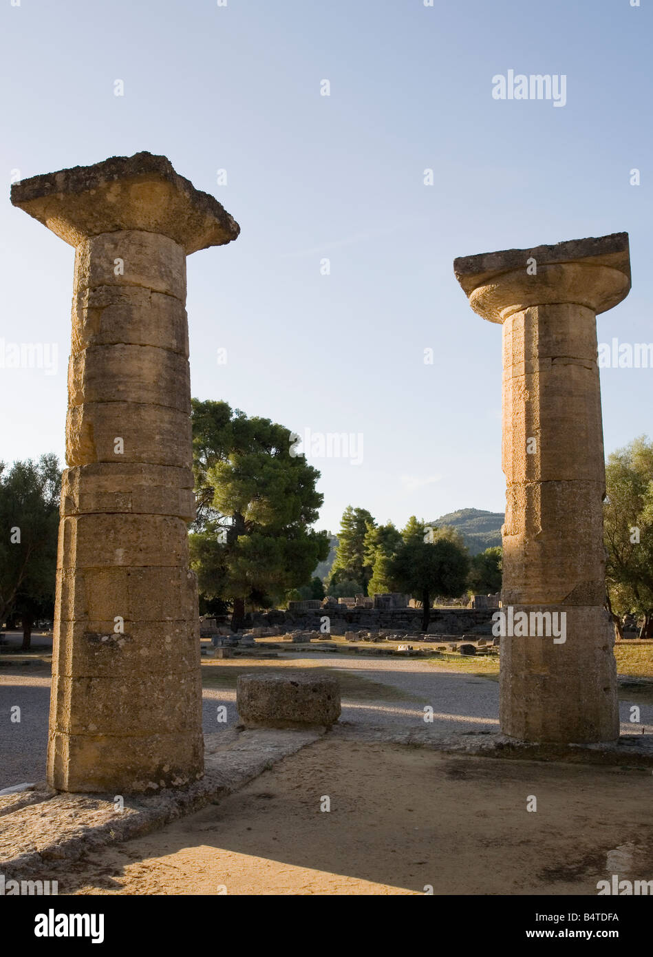 Heraion Temple Columns and Temple of Zeus beyond Sanctuary of Olympia Peloponnese Greece Stock Photo