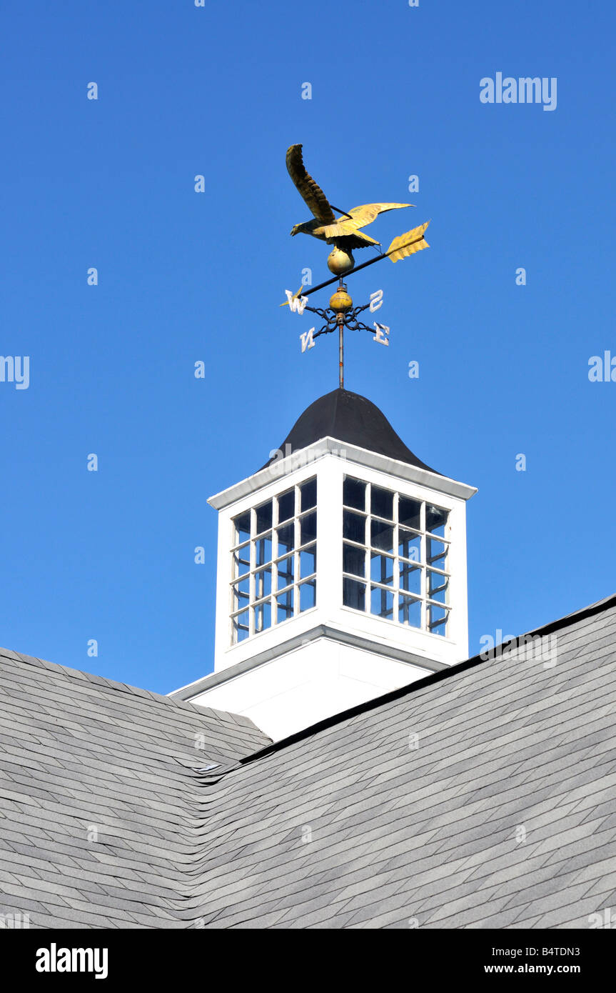White cupola with glass and metal eagle weathervane in New England blue sky Stock Photo Alamy