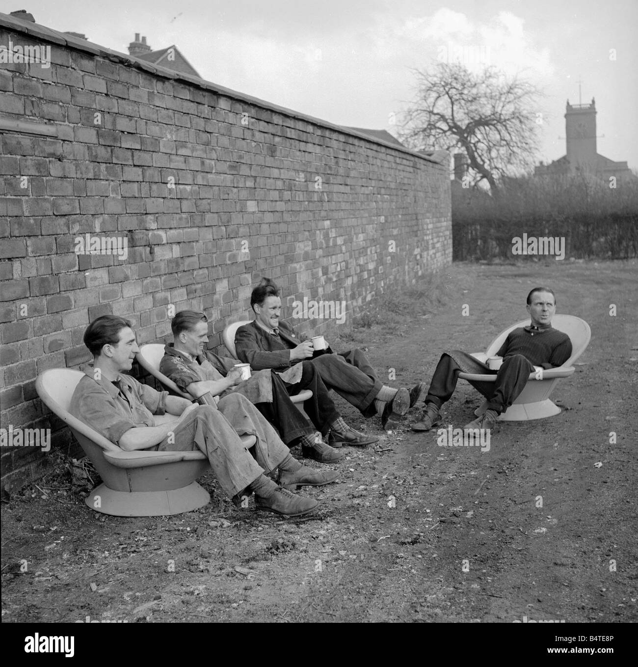 An alternative use for a hip bath These workmen are using them as seats