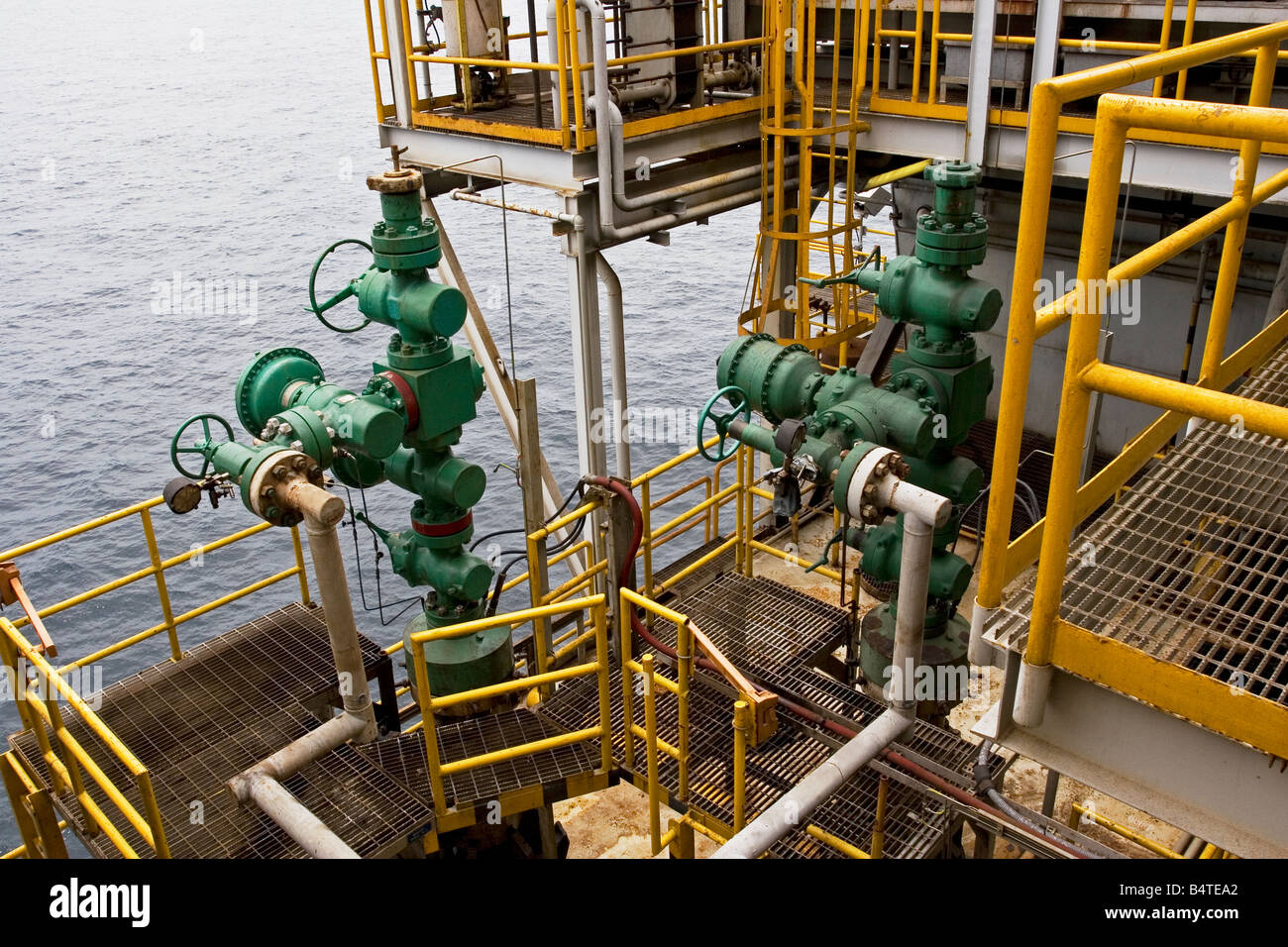 Well head area of offshore oil and gas production marine rig off coast of Gabon Stock Photo