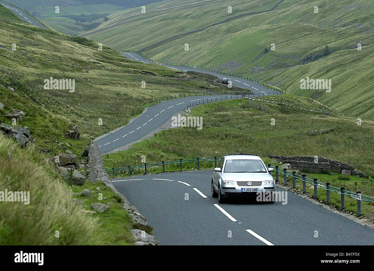 Picture by Phil Spencer Britain s No 1 driving road Buttertubs Pass near Hawes North Yorkshire Buttertubs Pass was yesterday voted BritainÍs favourite road The scenic pass through the Yorkshire Dales was chosen as BritainÍs ultimate driving experience in a survey of 2 100 drivers TV motoring guru Jeremy Clarkson hailed the road between Hawes and Thwaite as ñEnglandÍs only truly spectacular roadî The top three roads all surfaced in the North while the South East did not feature anywhere in the top ten Car maker Honda conducted the survey as part of their research into positive driving Stock Photo