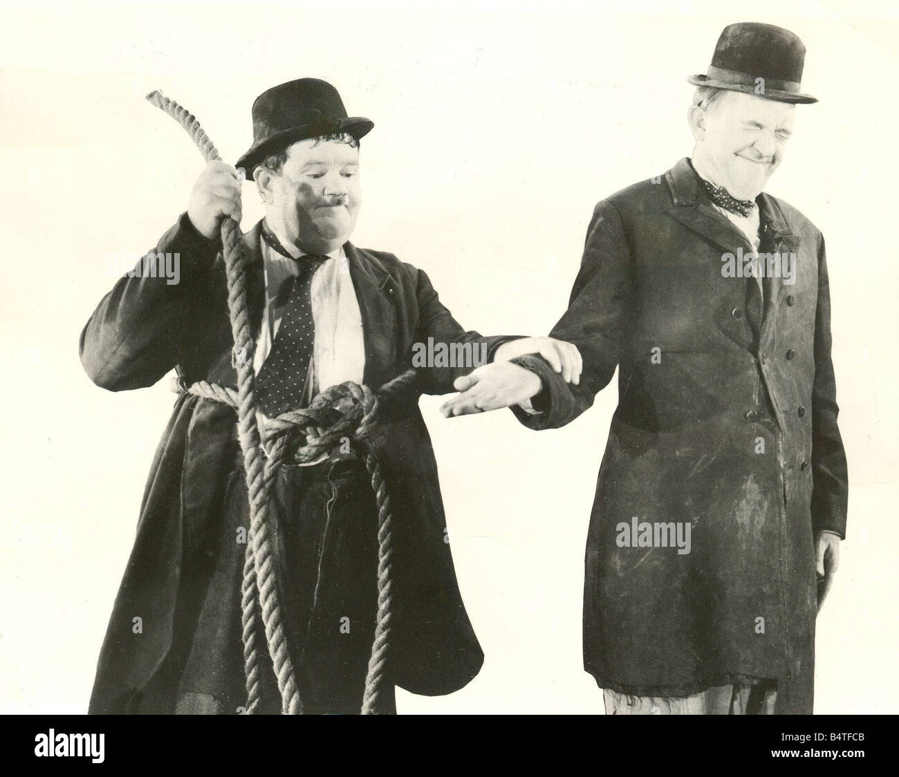 Laurel Hardy Comedy duo Stan Laurel and Oliver Hardy A scene from a film Stock Photo