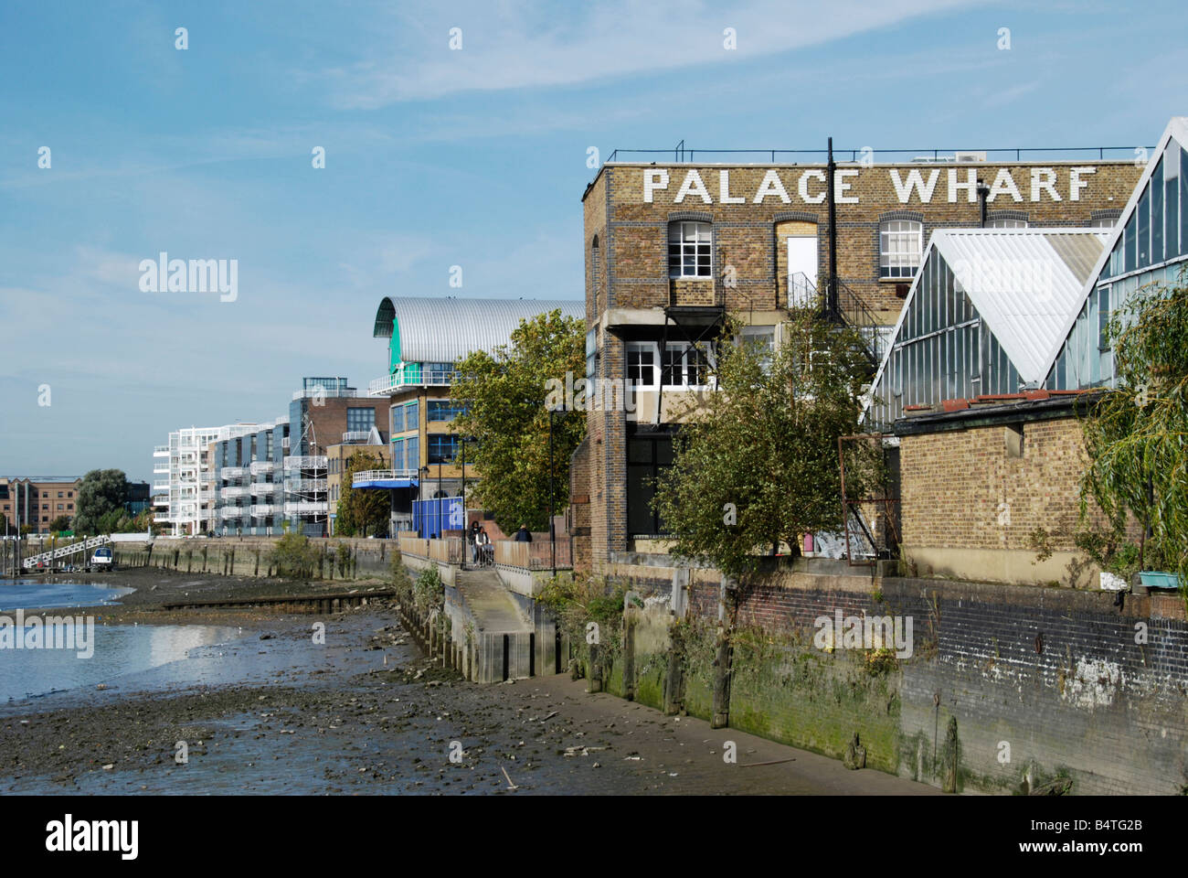 Palace Wharf and Thames Wharf developments next to the river Thames Hammersmith London England Stock Photo
