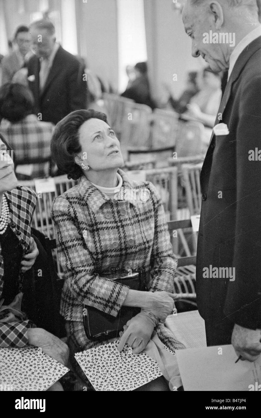 Duchess Of Windsor January 1967 Pictured at Fashion Show in Paris France with Captain Edward Molyneux Fashion Designer British Royalty 1960s Smiling Wallace Simpson Captain Molyneux Mirrorpix Stock Photo