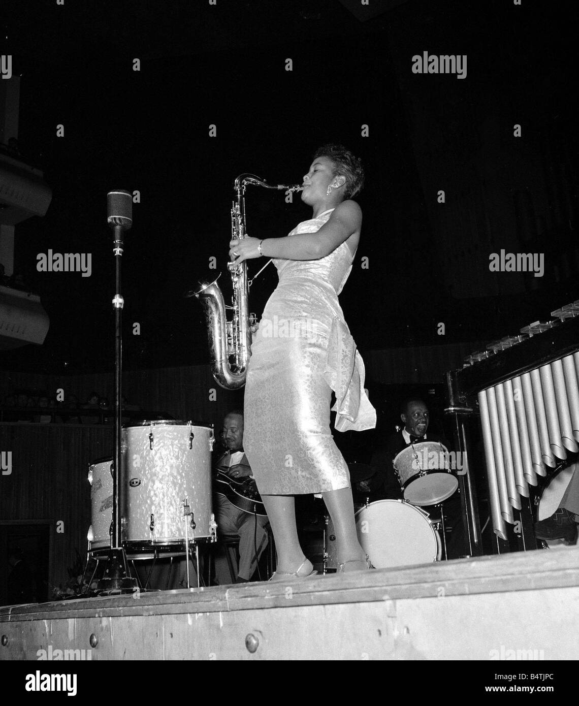 1950s Jazz performers Lionel Hampton band leader at the Royal Festival hall in London Band member plays saxophone Mirrorpix Stock Photo