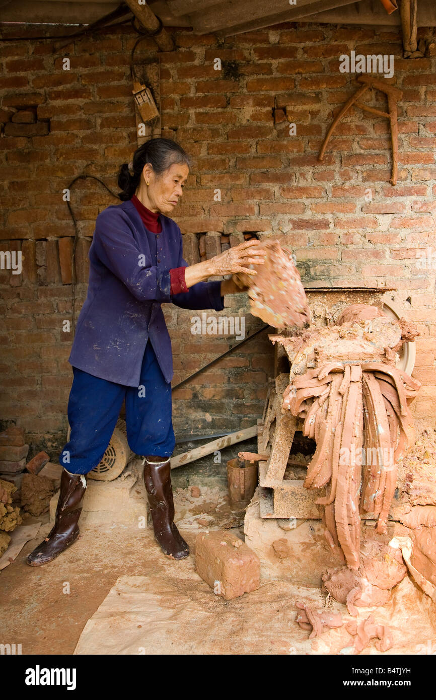 Pottery worker at a factory Stock Photo Alamy