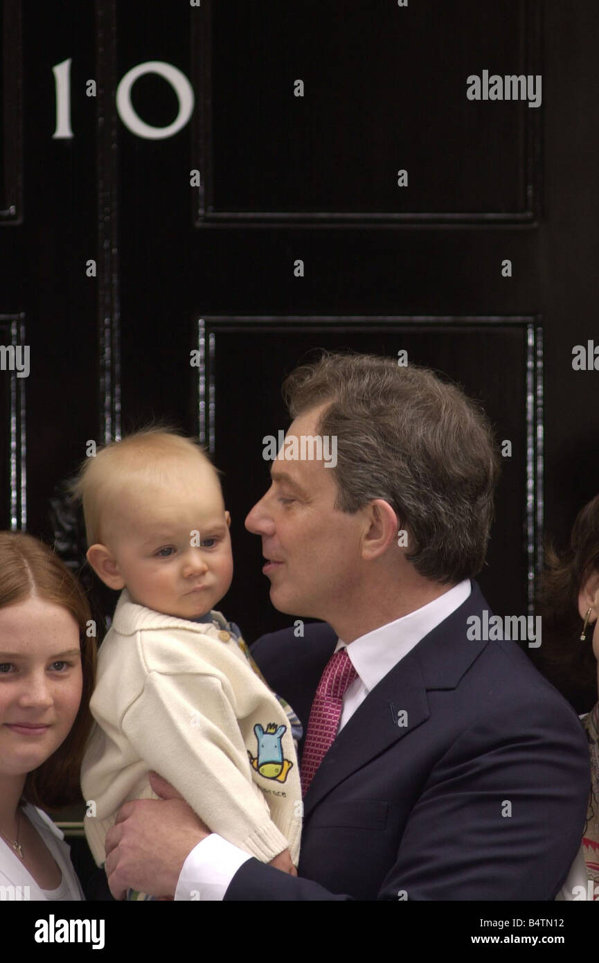 Prime Minister Tony Blair June 2001 holding son Leo outside No10