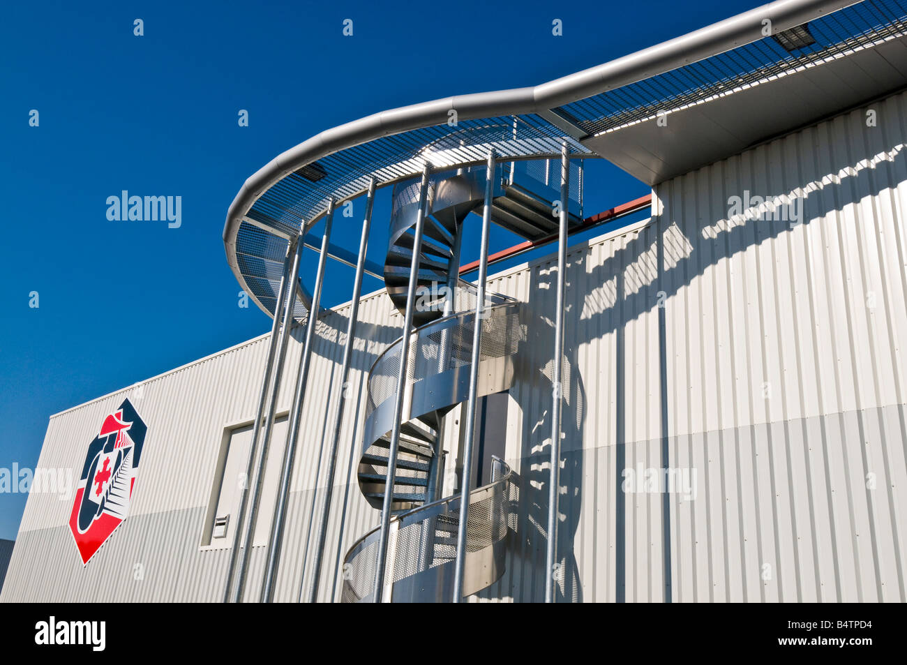 Spiral staircase outside "Les Mousquetaires" superstore, France. Stock Photo