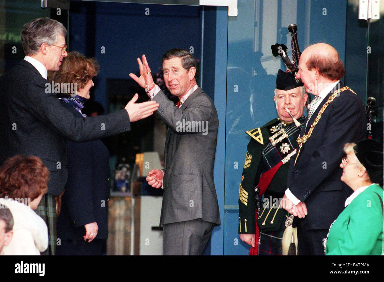 Prince Charles Prince of Wales January 1998 arrives at the Piping Centre Glasgow Waving at public Lord Provost Pat Lally looks on Stock Photo