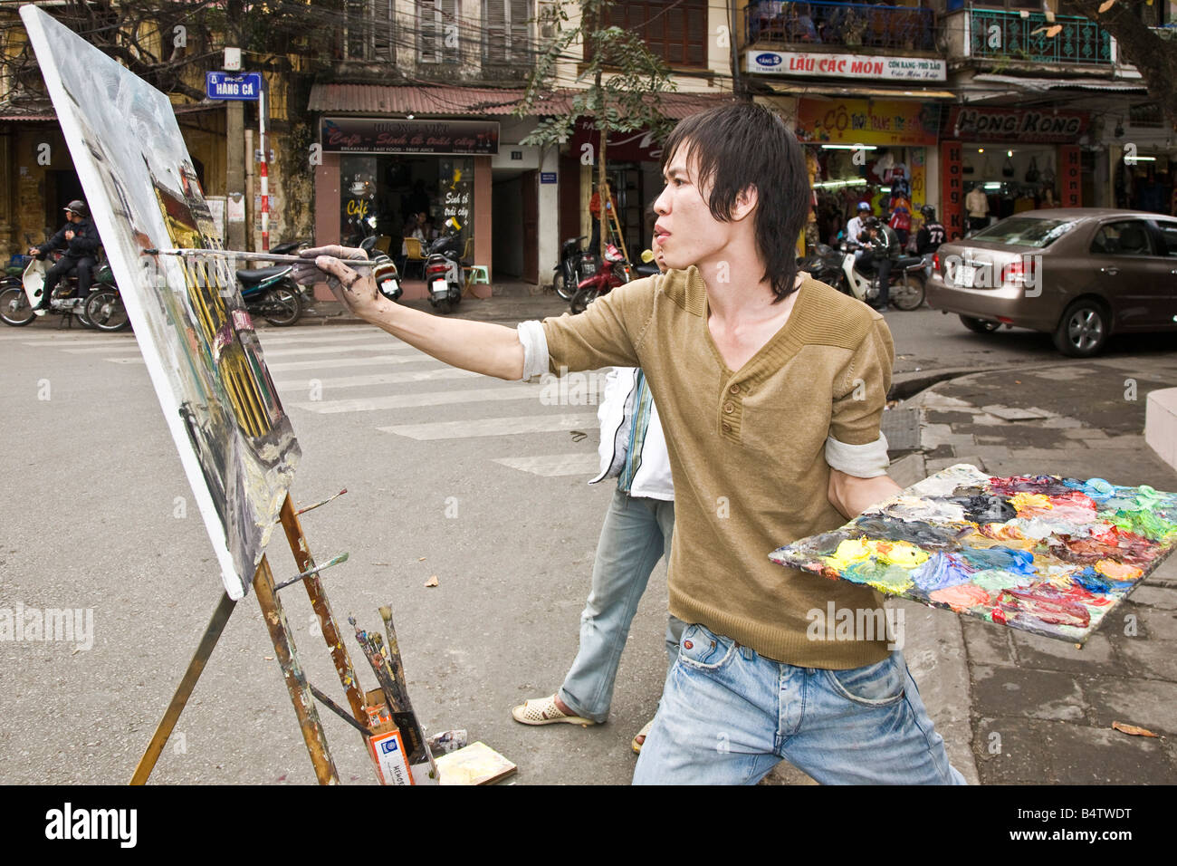 Artist and painting Hanoi north Vietnam Stock Photo Alamy