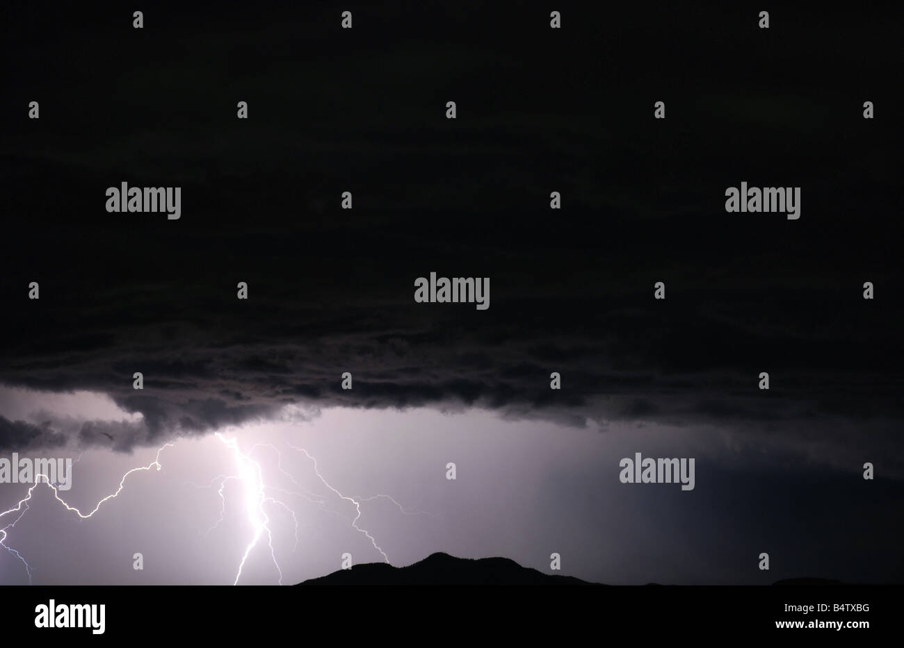 Five bolts of lightning on a stormy night over Raton, New Mexico Stock Photo