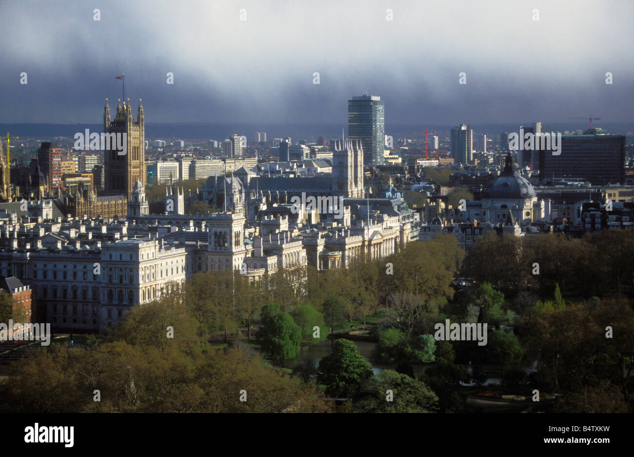 Stormy weather conditions over London, Houses of Parliament visible to left, Westminster Abbey in centre, London, United Kingdom Stock Photo