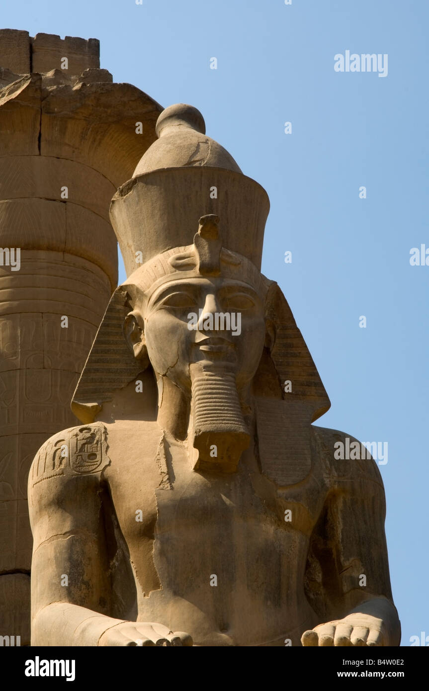 Colossal seated statue of Rameses II, Luxor Temple, UNESCO World Heritage Site, Luxor, Egypt Stock Photo