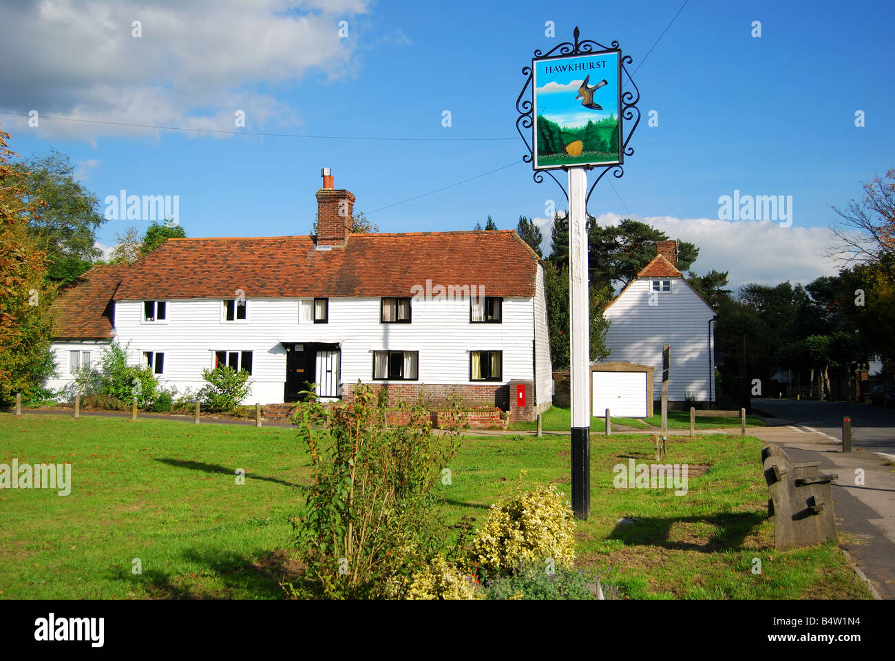 Village sign on village green. Hawkhurst, Kent, United Kingdom Stock