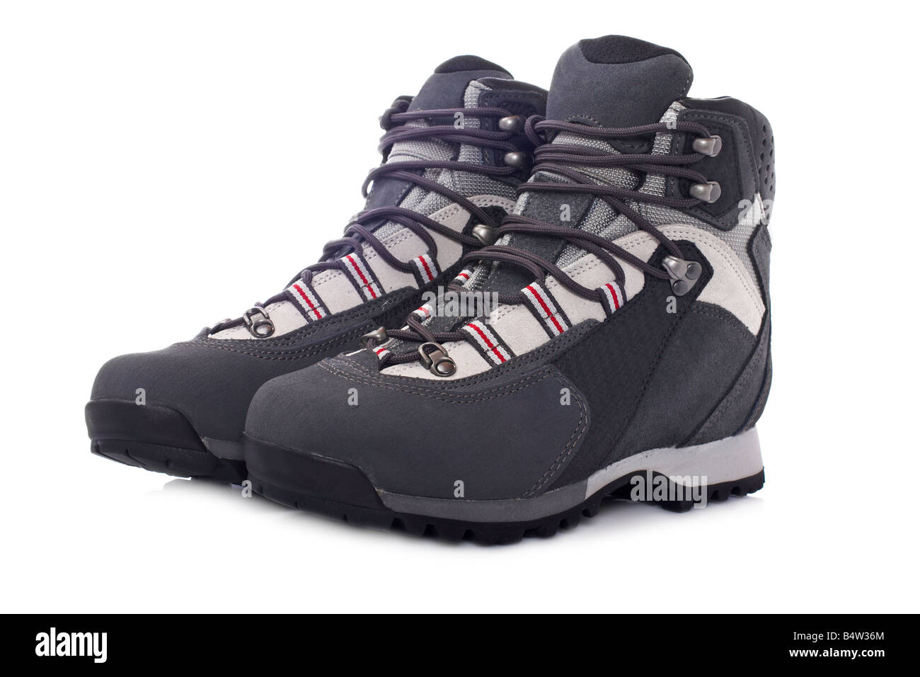 A pair of hiking boots with soft shadow on white background Stock Photo ...