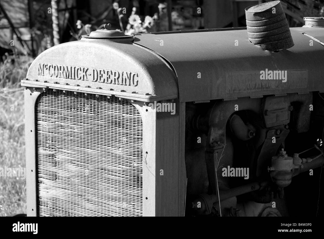 Close up black and white image of a very old tractor Stock Photo - Alamy