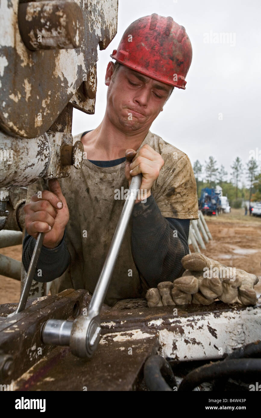 Mancelona Michigan A worker takes apart a natural gas drilling rig in
