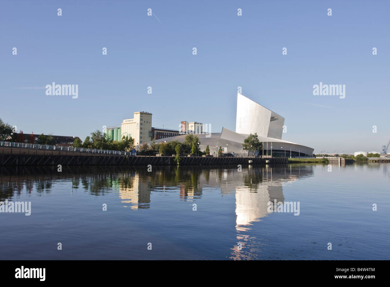 The Imperial War Museum North Reflected in the Manchester Ship Canal ...