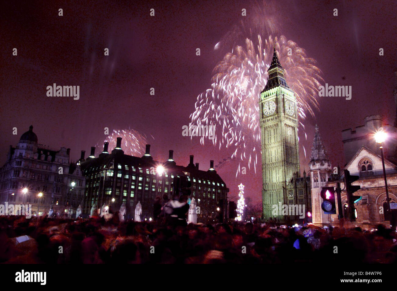 A firework display lights up Big Ben January 2000 as part of the Millennium celebrations in 