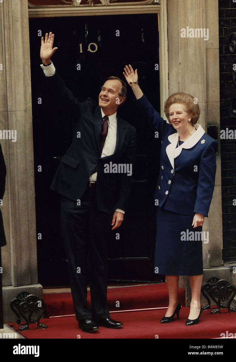 George Bush President of the United States with Prime Minister Margaret Thatcher on the steps of 10 Downing Street Stock Photo