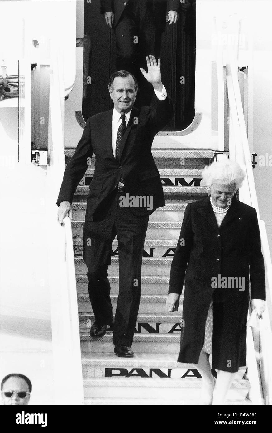 President George Bush of the United States arrives with his wife and his wife Barbara at Heathrow Airport May 1989 Stock Photo