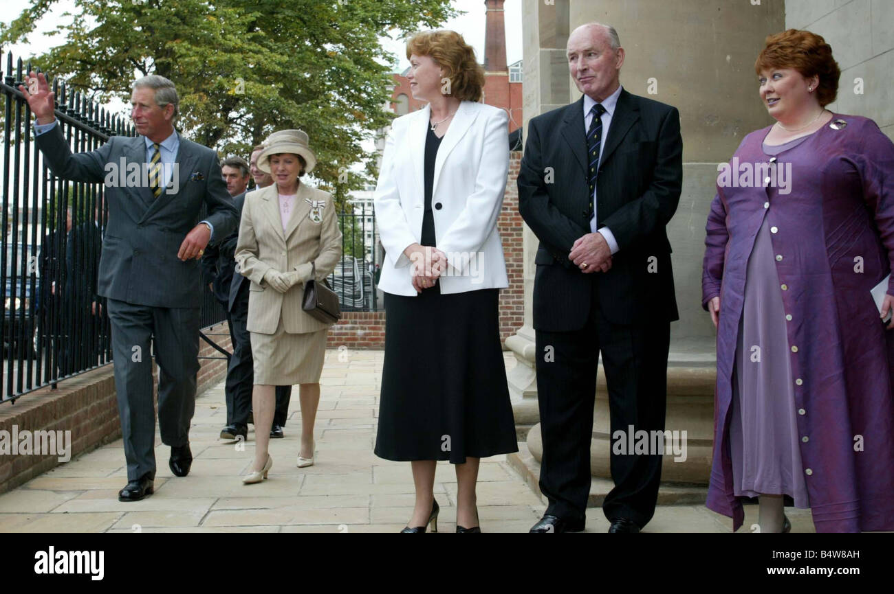 Prince Charles Visits Christ Church In Belfast September 2003 Prince Charles arriving at Christ Church opening waves to the public with Lady Carswell OBE Angela Smith Dr Bob Rodgers OBE Mrs Fionnuala Jay O Boyle MBE Stock Photo