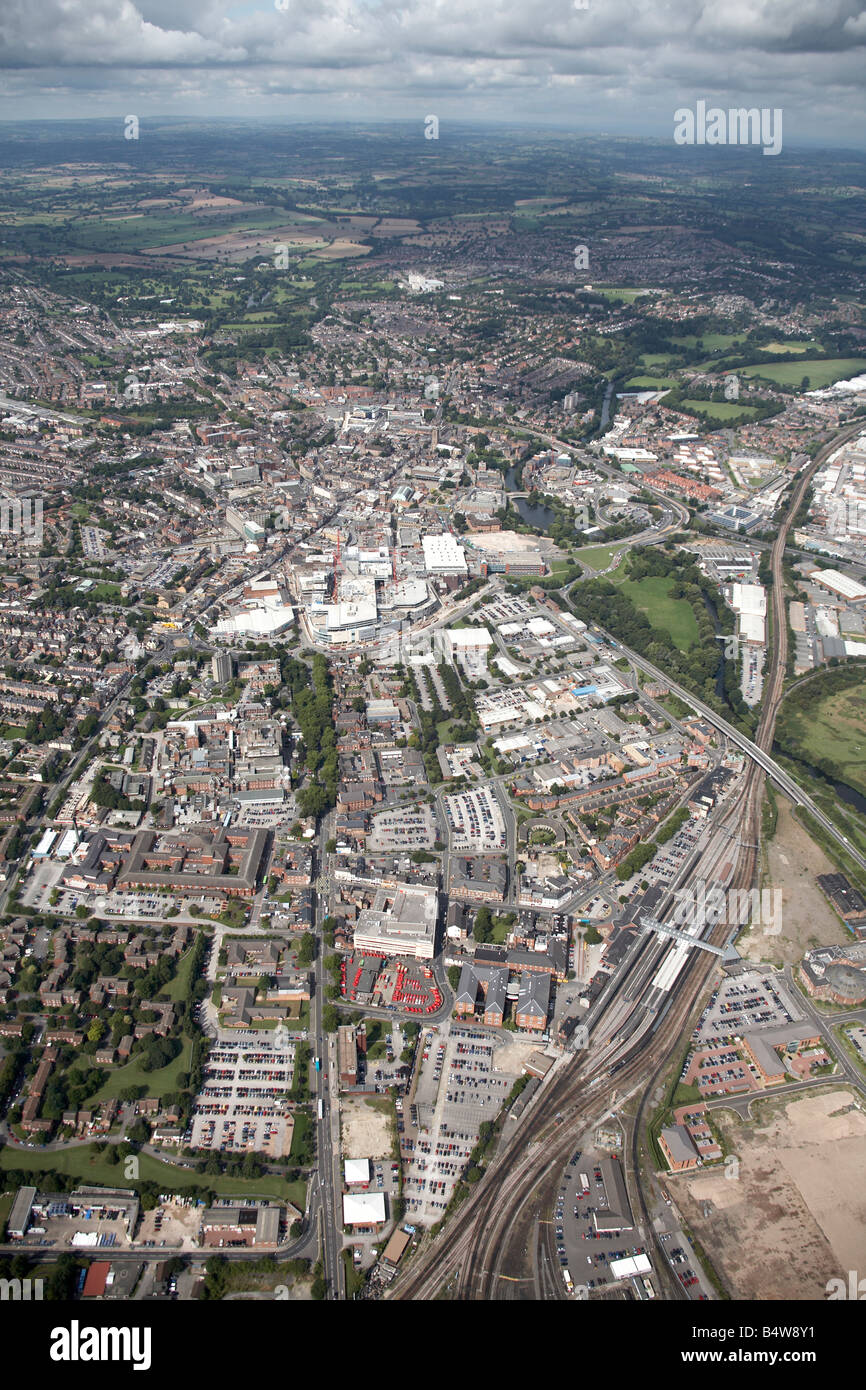 Aerial view north west of Derby City Centre train station Station Approach London Road suburban houses country fields Derbyshire Stock Photo