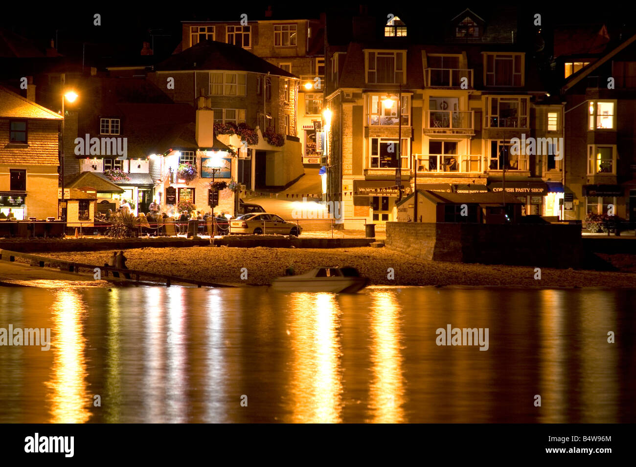 Saint Ives, Cornwall, night scene by the harbour side with lights and reflections. Stock Photo