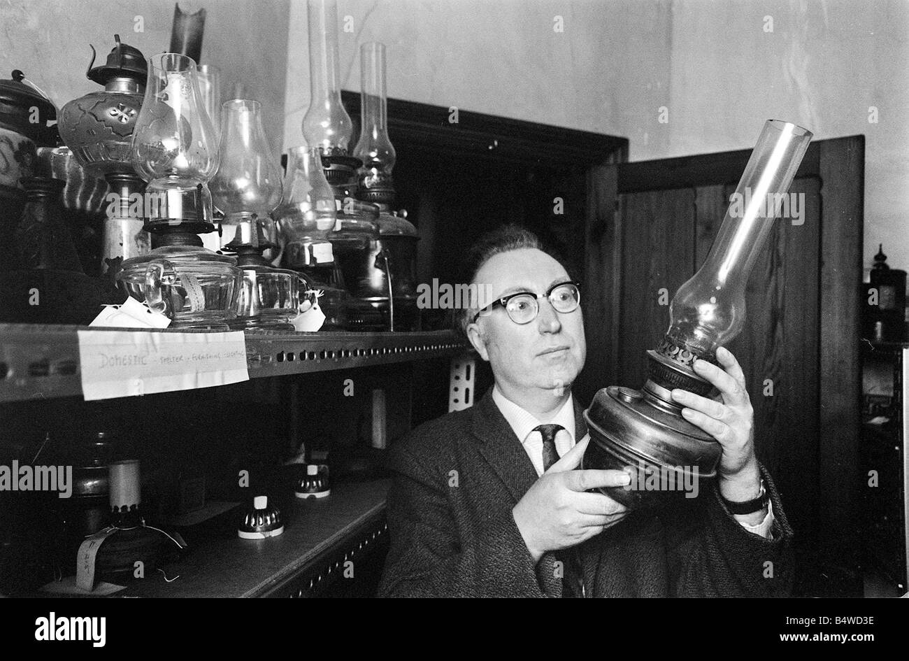 Bowes Museum Jan 1970 Director Frank Atkinson studies some of the antque items donated towards the open air museum planed for Beamish Park in the North East Stock Photo