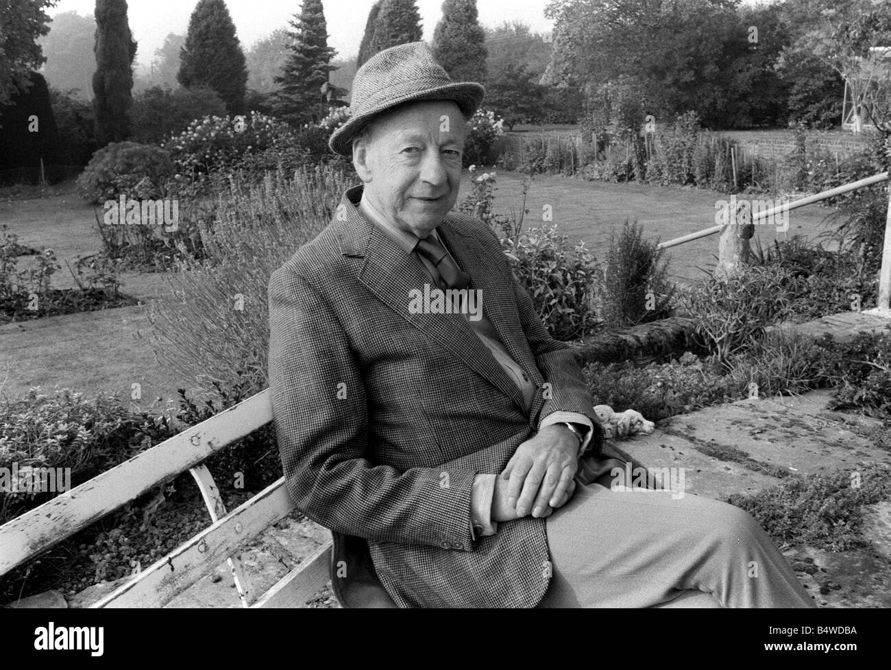 Winston Graham author novelist and screen writer October 1985 seated on a bench in his garden Winston Graham was born in Manchester on June 30 1910 He has been writing novels since the age of 17 Ross Poldark was first published in 1945 followed by Demelza in 1946 Jeremy Poldark in 1950 and Warleggan in 1953 He now lives in Sussex in Abbotswood House Before moving to Sussex Winston Graham spent thirty years at Perranporth in Cornwall There at Flat Rocks he wrote the first four Poldark books which the Illustrated London News pronounced not only rattling good yarns but full of incredibly Stock Photo