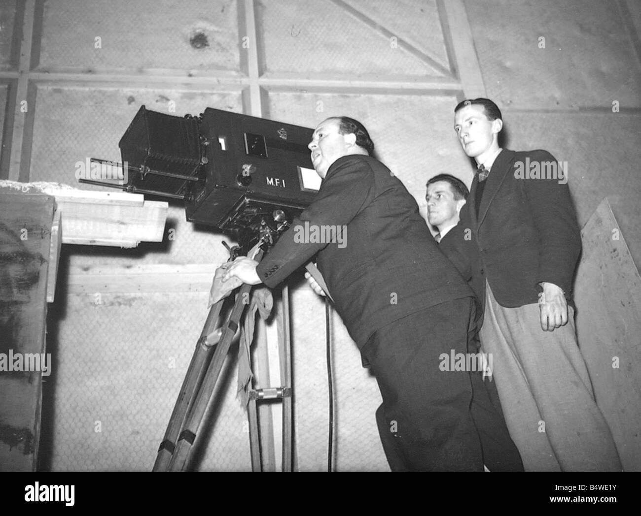 Alfred Hitchcock on the set of his 1939 film Jamacia Inn Entertainment Film Kine Camera Cameraman Film Studio Circa 1939 1930s Stock Photo