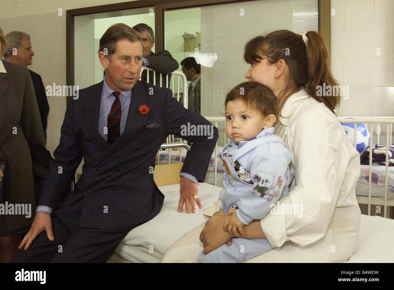 Prince Charles talks to Ianka Konstantinov and her baby son Bojidar aged 1 at the Tsaritsa Johanna Hospital cancer ward in Sofia Bulgaria The Prince toured the hospital after arriving in the Bulgarian capital Stock Photo