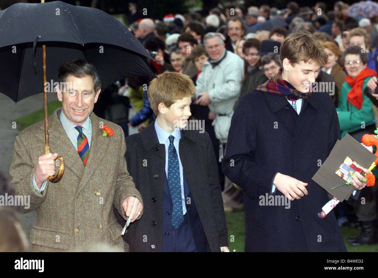 Prince Charles at Sandringham December 1998 arriving with sons Prince William and Prince Harry for Christmas Service at Church the Royal Church Service in St Mary Magdalene Church Stock Photo