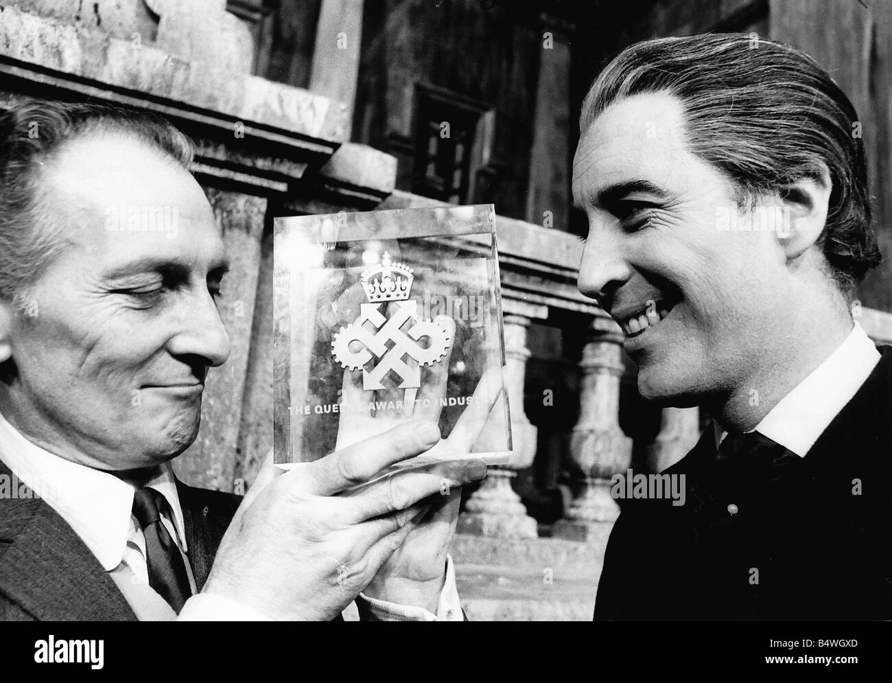 Christopher Lee with Peter Cushing with the The Queen s award for industry  which had been awarded to Hammer Films dbase msi Stock Photo - Alamy
