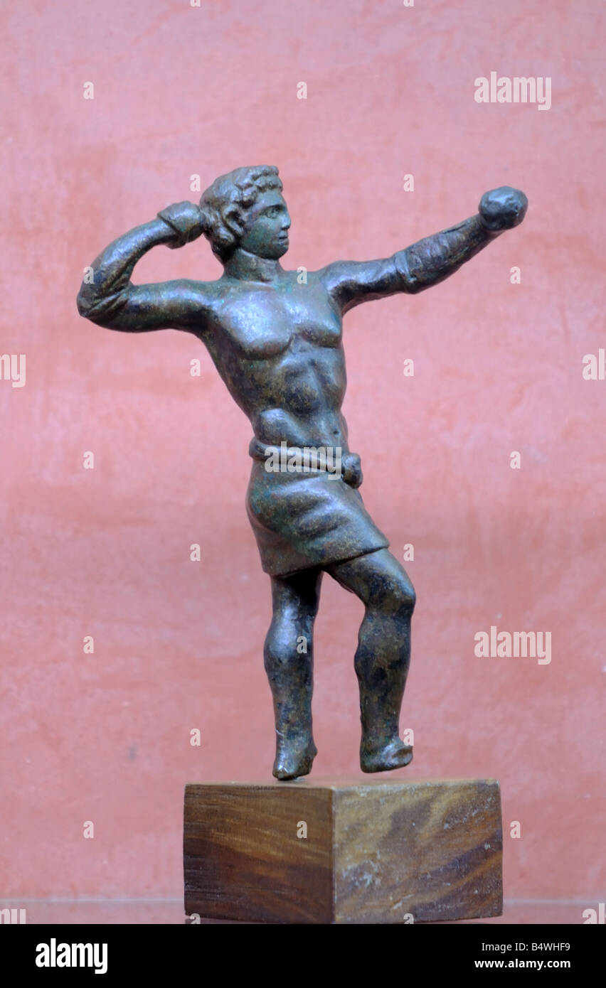 Small bronze statue sculpture cast of pugilist boxer fighter man on display National Museum of Roman Art Merida Spain Stock Photo