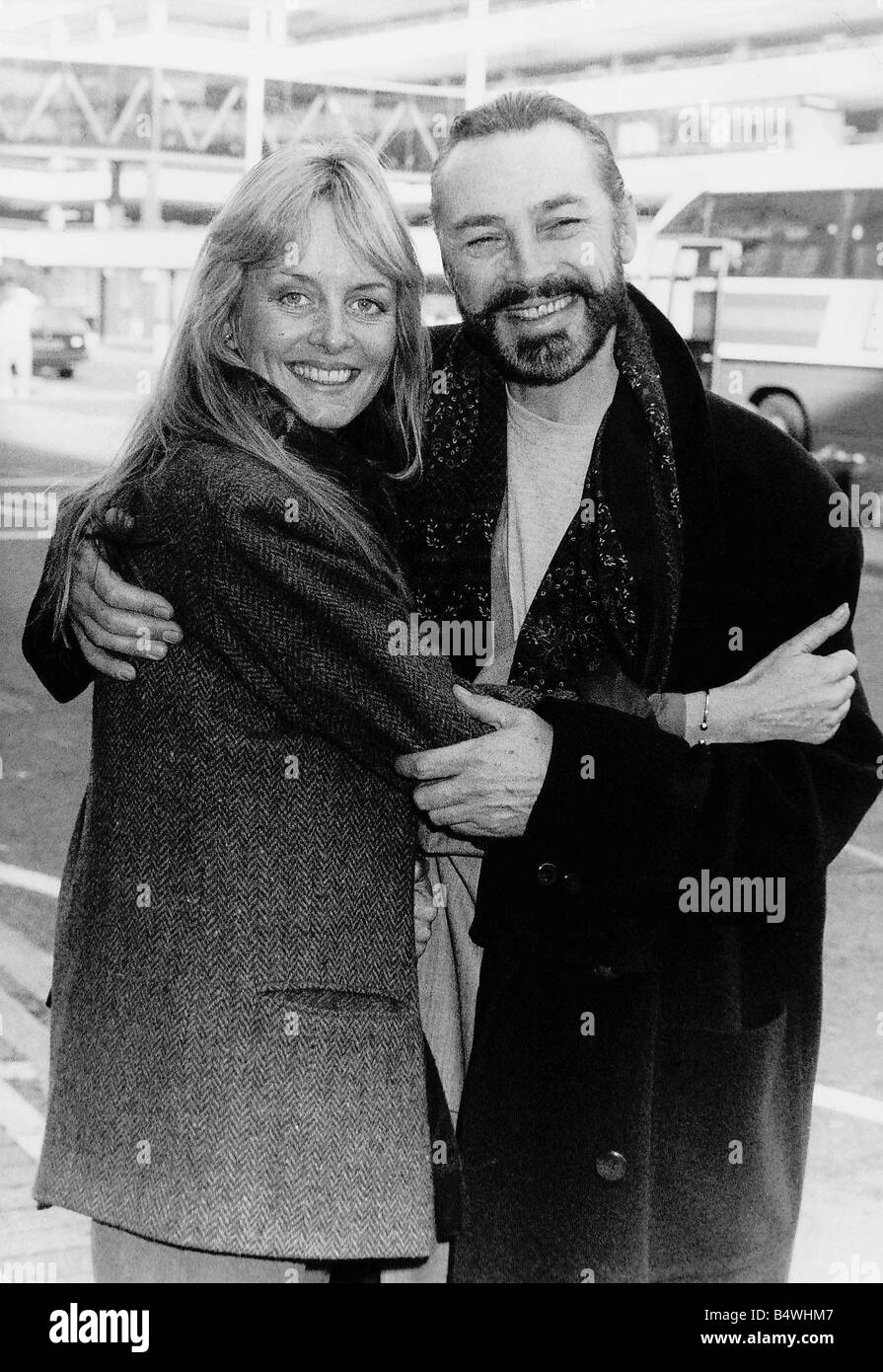 Twiggy Model and Actress with husband Actor Leigh Lawson at Heathrow Airport Stock Photo