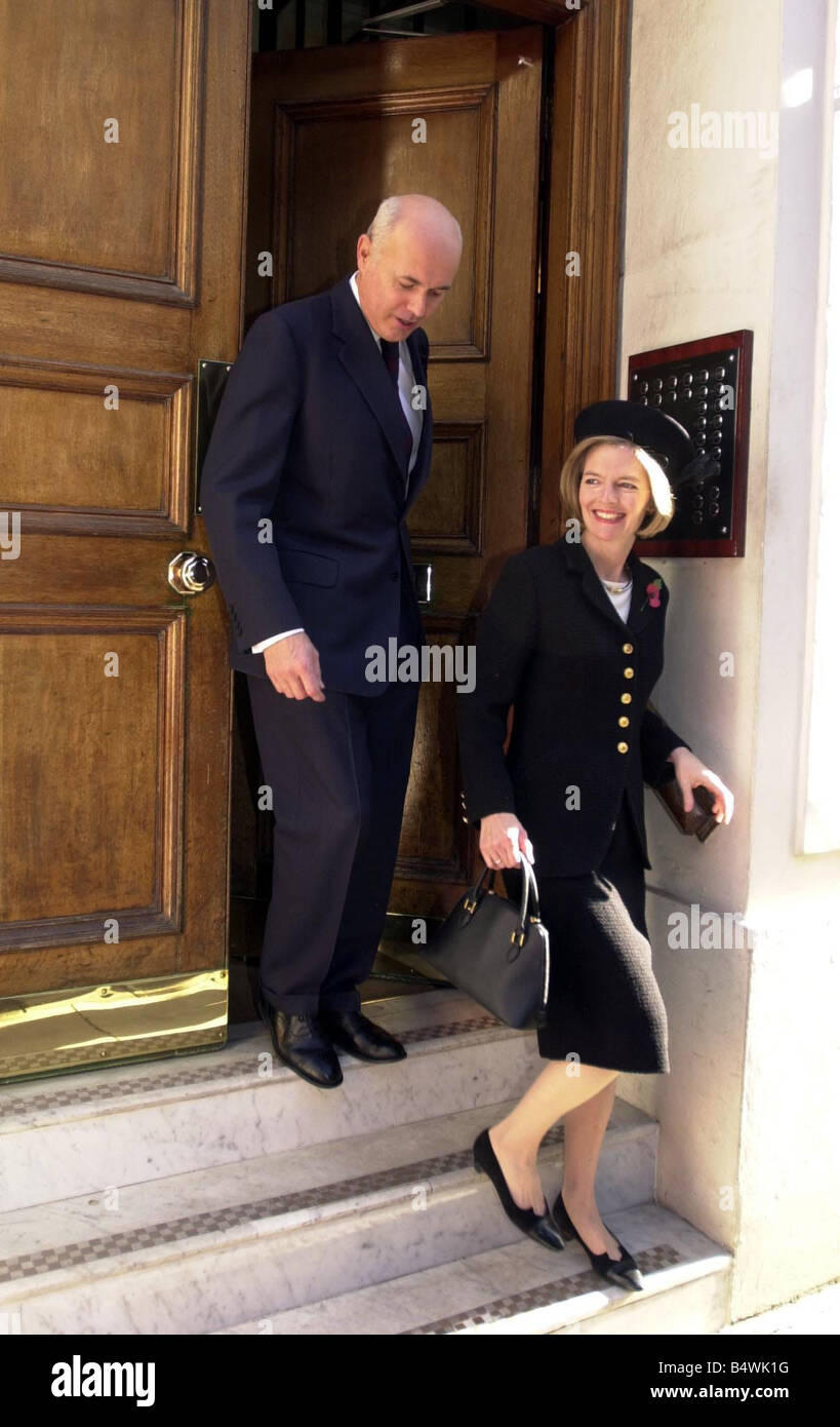 Conservative Party leader Iain Duncan Smith leaves his London home with his wife Betsy to attend the Denis Thatcher memorial service October 2003 Stock Photo
