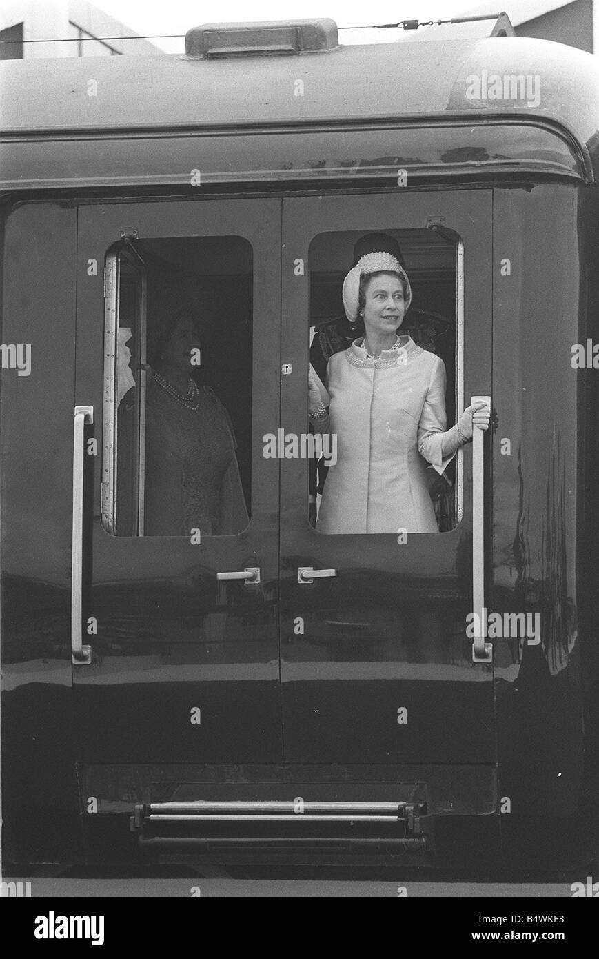 Queen Elizabeth looks out of the Royal Train after arriving in Wales