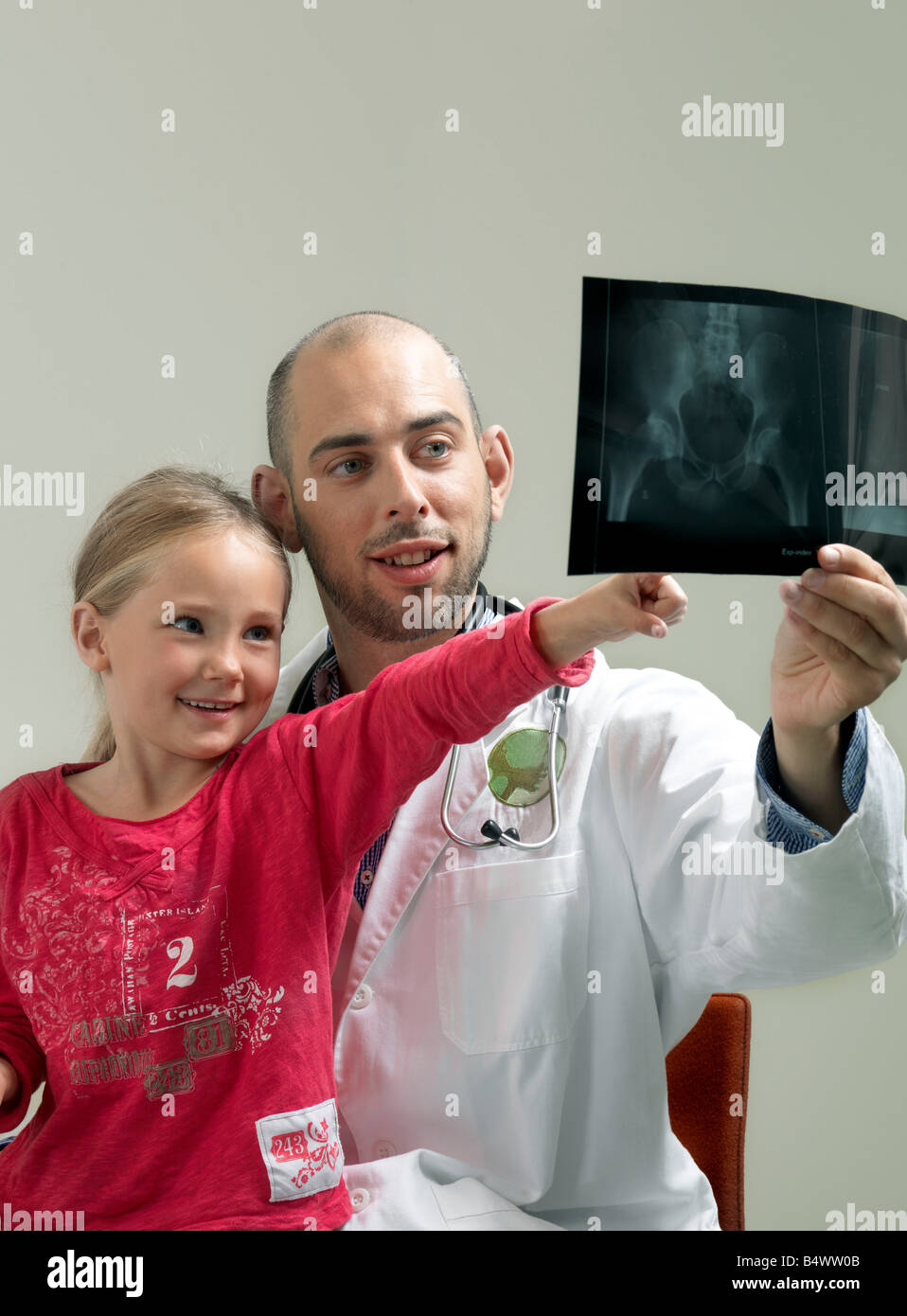 Girl and doctor with xray Stock Photo Alamy