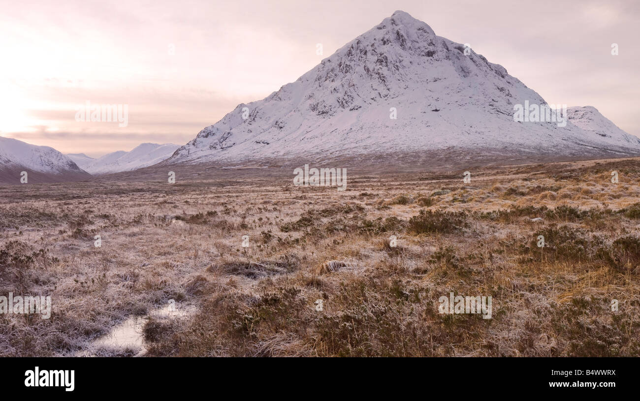 Snow covered Buachaille Etive Mhor at the head of Glen Etive, towards the pass of Glencoe Stock Photo