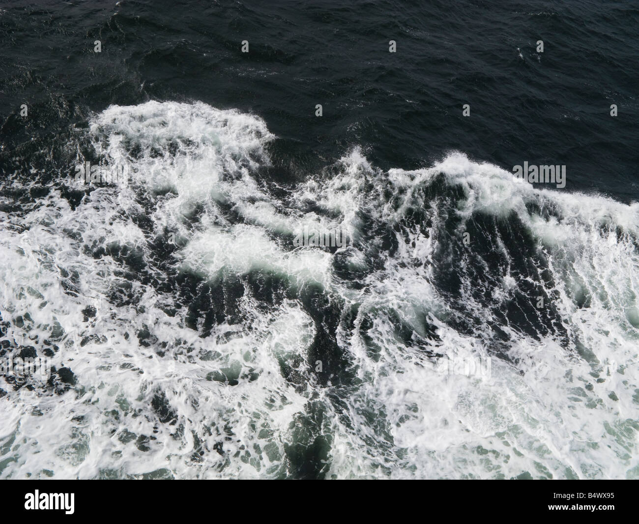 Waves from the side of the ferry to Mull Stock Photo