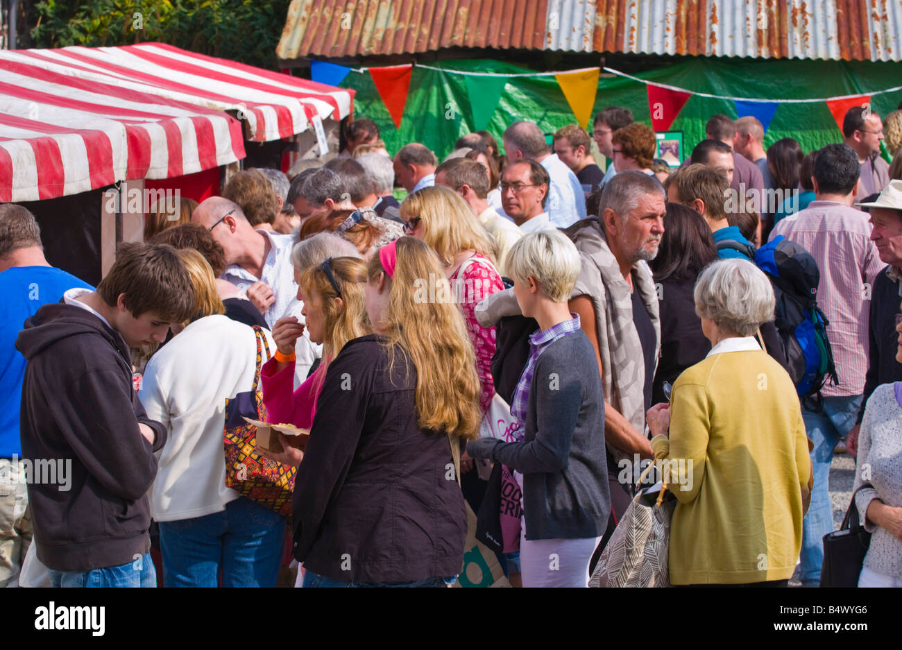 People wander and browse openair stalls at Abergavenny Food Festival Stock Photo