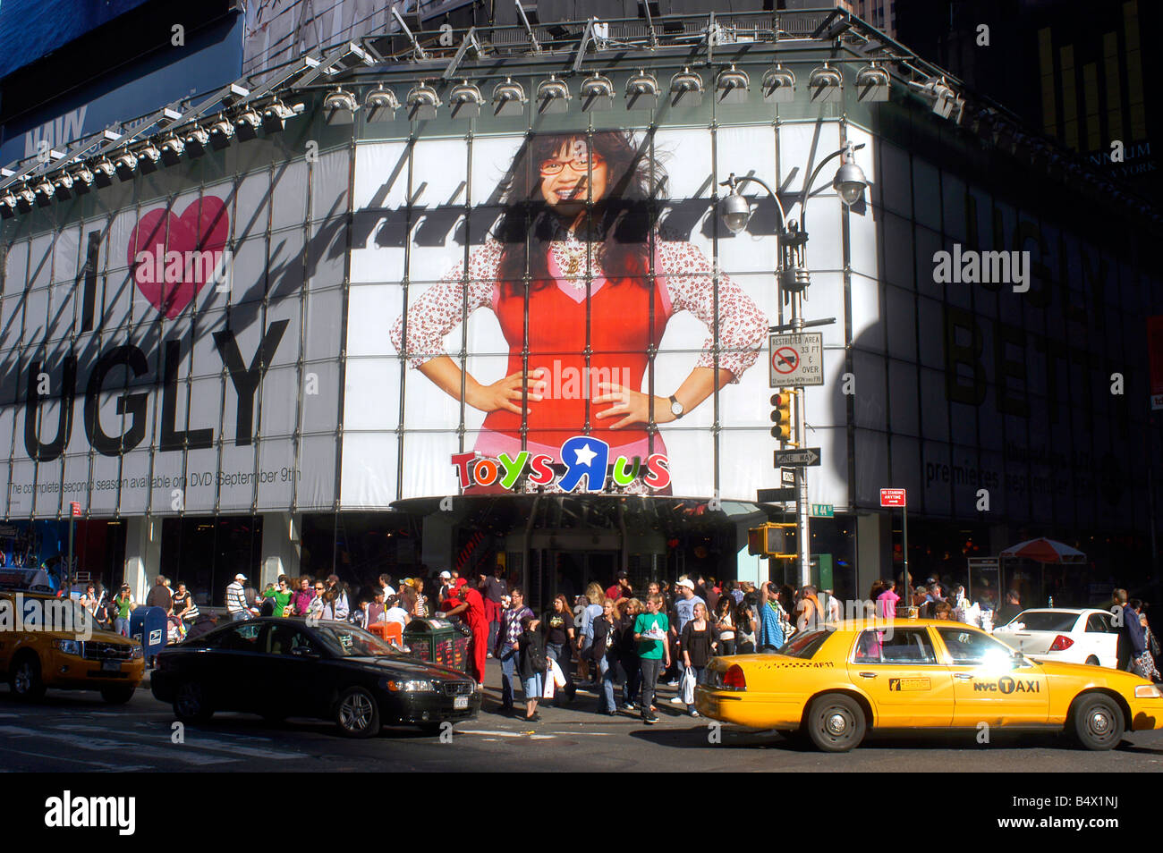 Advertising for the ABC television program Ugly Betty appears on a billboard on the Toys R Us store in Times Square Stock Photo